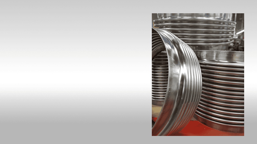 Stainless steel industrial rims and wheels for manufacturing processes.