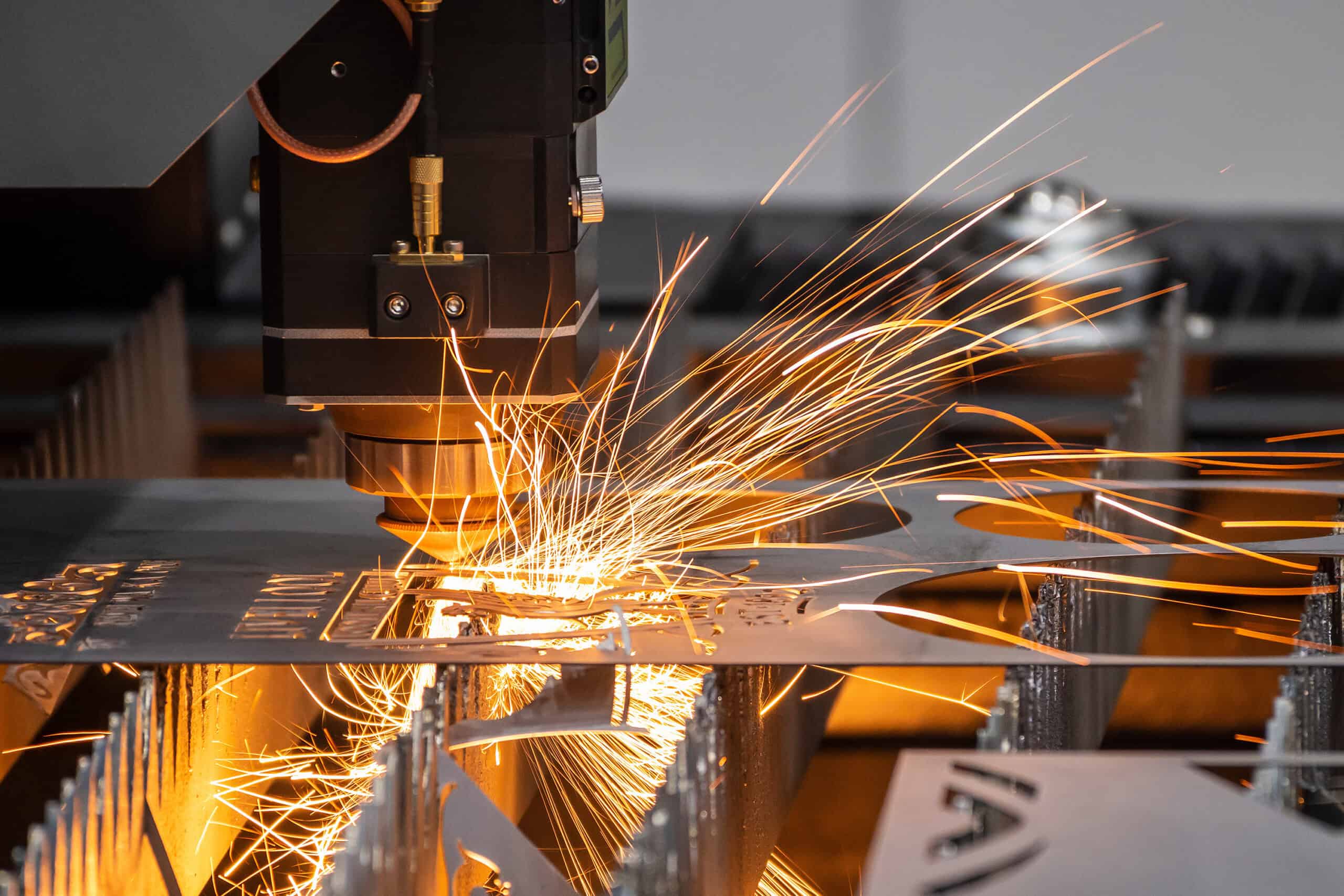 High-precision laser cutting metal fabrication at Kelco Industries, expert in industrial metal services.