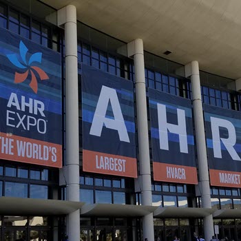 AHR Expo large banners showcasing HVAC and refrigeration industry leadership at Kelco Industries event.