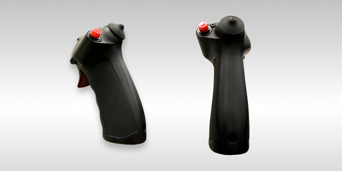 Black handheld ergonomic spraying tools for industrial applications.