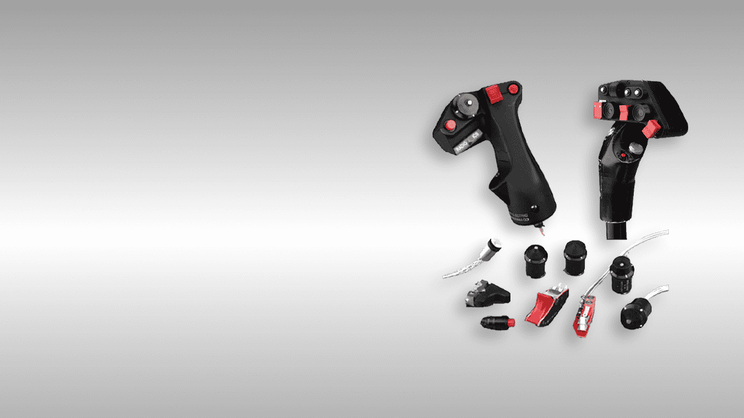 Industrial robotic arm controllers with various tools and attachments for manufacturing automation.