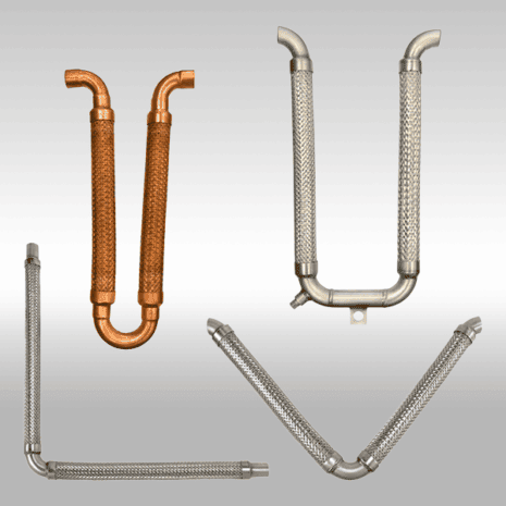 Copper and stainless steel industrial pipe fittings for HVAC and plumbing systems.