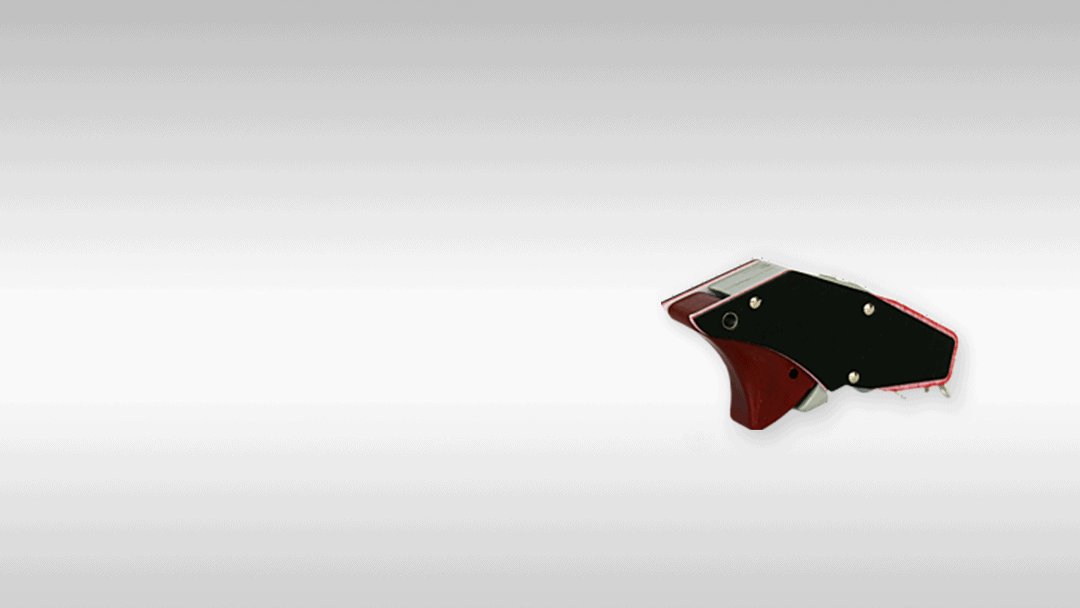 Precision industrial blade in red and black for manufacturing applications.