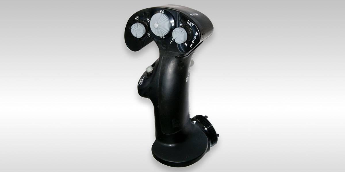 Ergonomic joystick controller for industrial machinery and equipment.